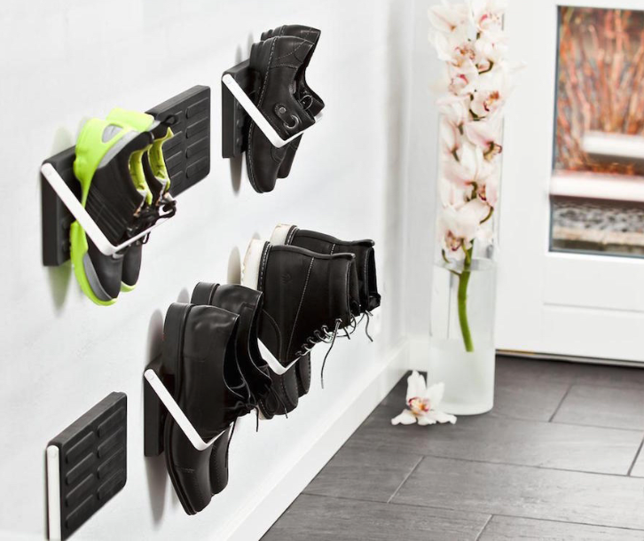 Organized closets // how to organize your shoes // shoe storage ideas // extra storage // DIY shoe storage // small space storage solutions // entryway shoe hooks // www.SimplySpaced.com