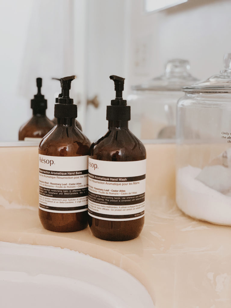 Streamline your beauty products to update your guest bathroom.