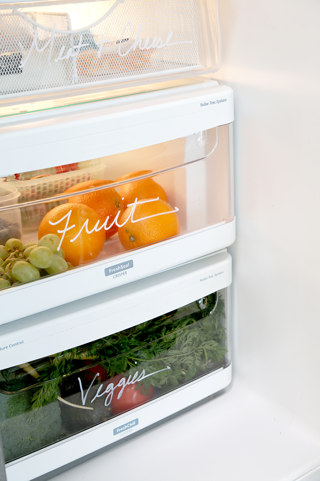 Organized fruit and vegetable drawer in a refrigerator